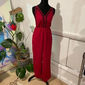 Red Tobi jumpsuit with cutouts and pockets